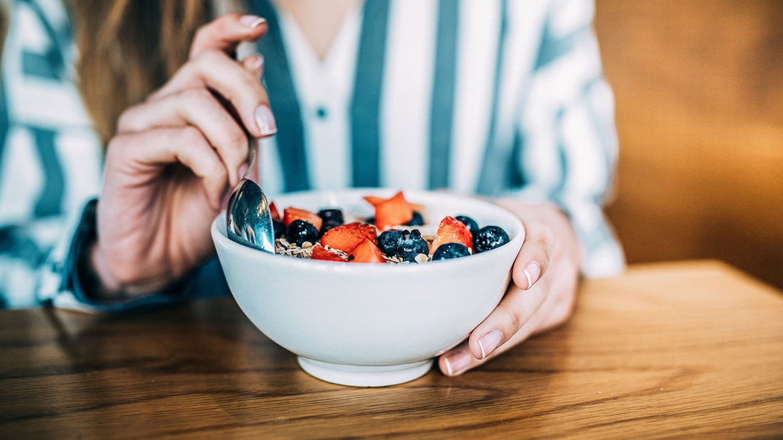 Woman eating healthy porridge